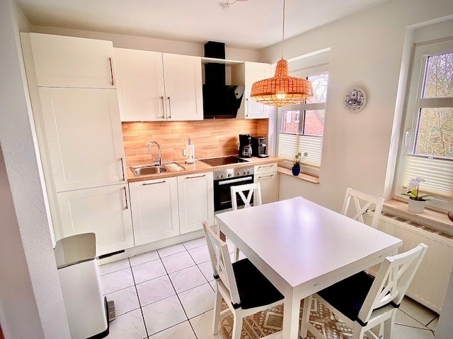 Foto 1 Ferienwohnung Ostfriesland Rheiderland Ferienwohnung Seute Deern in Ditzum direkt an der Mühle (Objekt 100989) buchen