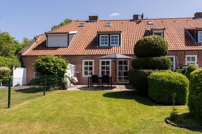 Foto 1 Ferienwohnung Ostfriesland Krummhörn & Umgebung Up de Warft – Ferienwohnung Manslagt (Objekt 100979) buchen